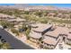 Overhead shot of neighborhood showcasing home and community with mountain views at 437 Pinnacle Heights Ln, Las Vegas, NV 89144