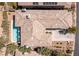 Aerial view showing backyard pool, house, and driveway at 437 Pinnacle Heights Ln, Las Vegas, NV 89144