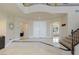 Grand foyer with marble floors, a staircase, and an elegant entryway with double doors at 437 Pinnacle Heights Ln, Las Vegas, NV 89144