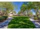 Well-maintained green space with walking paths, inviting leisurely strolls at 437 Pinnacle Heights Ln, Las Vegas, NV 89144