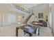 Open concept living room with high ceilings, a fireplace, staircase and dining area at 437 Pinnacle Heights Ln, Las Vegas, NV 89144
