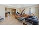 Open-concept living room flows into kitchen and features stylish seating and decor at 437 Pinnacle Heights Ln, Las Vegas, NV 89144