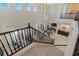 Expansive living room with soaring ceilings, large windows, and contemporary light fixture at 437 Pinnacle Heights Ln, Las Vegas, NV 89144