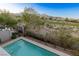 Gorgeous pool and golf course view from backyard with mountain views beyond at 437 Pinnacle Heights Ln, Las Vegas, NV 89144