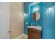 Stylish powder room featuring unique lighting fixtures and modern vanity at 437 Pinnacle Heights Ln, Las Vegas, NV 89144