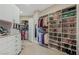 Luxurious walk-in closet with custom shelving, storage cabinets, and ample space for clothes and accessories at 437 Pinnacle Heights Ln, Las Vegas, NV 89144