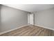 This bedroom features wood floors and neutral paint at 4387 Sun Vista Dr, Las Vegas, NV 89104