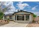 Charming single-story home showcasing a well-maintained yard, a concrete driveway and new exterior paint at 4387 Sun Vista Dr, Las Vegas, NV 89104