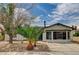 Charming single-story home featuring desert landscaping, fresh exterior paint, and a welcoming entrance at 4387 Sun Vista Dr, Las Vegas, NV 89104