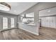 Bright kitchen features modern cabinetry, stainless hood, and access to backyard through glass doors at 4387 Sun Vista Dr, Las Vegas, NV 89104