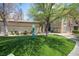 Community dog park area with artificial turf and pet waste station at 4400 S Jones Blvd # 2075, Las Vegas, NV 89103
