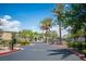 Community entrance with a black iron gate and mature landscaping at 4400 S Jones Blvd # 2075, Las Vegas, NV 89103