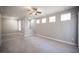 Bright living room showcasing modern flooring, natural light from windows, and a ceiling fan at 4400 S Jones Blvd # 2075, Las Vegas, NV 89103