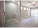 A bright living room is enhanced by natural light, with sleek wood floors and a ceiling fan at 4400 S Jones Blvd # 2075, Las Vegas, NV 89103