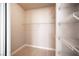 Functional walk-in closet with wood-look flooring and multiple wire shelves for optimal storage at 4400 S Jones Blvd # 2075, Las Vegas, NV 89103