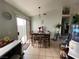 Cozy dining area featuring a sliding glass door for ample natural light and outdoor access at 4568 Little Finch Ln, Las Vegas, NV 89115