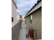 Narrow side yard featuring a block wall and tidy landscaping at 4568 Little Finch Ln, Las Vegas, NV 89115