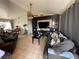 Relaxing living room offers comfortable seating, a ceiling fan, and a built-in entertainment center at 4568 Little Finch Ln, Las Vegas, NV 89115
