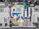 Birds eye view of a home with solar panels, RV parking and desert landscaping at 4644 Canna Dr, Las Vegas, NV 89122