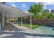 Inviting covered patio with ample seating space, ideal for outdoor dining and enjoying the serene backyard ambiance at 4644 Canna Dr, Las Vegas, NV 89122