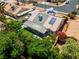 This is a home with solar panels, covered patio, RV parking, and mature landscaping at 4644 Canna Dr, Las Vegas, NV 89122