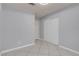 Bedroom featuring neutral walls, tile floor, closet, and ceiling fan at 4644 Canna Dr, Las Vegas, NV 89122