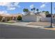 Single story home with desert landscaping and an attached two car garage at 4644 Canna Dr, Las Vegas, NV 89122
