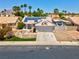 Charming single-Gathering home featuring solar panels, desert landscaping, and a two-car garage at 4644 Canna Dr, Las Vegas, NV 89122