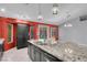 Kitchen featuring stainless steel appliances, granite countertops, a pantry, and a breakfast bar at 4644 Canna Dr, Las Vegas, NV 89122