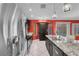 Kitchen featuring stainless steel appliances, granite countertops, a pantry, and a breakfast bar at 4644 Canna Dr, Las Vegas, NV 89122