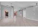 Spacious living room featuring tile floors, neutral walls, and ample natural light at 4644 Canna Dr, Las Vegas, NV 89122