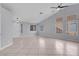 Large living space with tile floors and an inviting neutral color palette at 4644 Canna Dr, Las Vegas, NV 89122