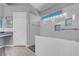 Main bathroom with soaking tub, walk-in shower, and modern fixtures at 4644 Canna Dr, Las Vegas, NV 89122
