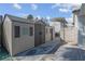 Spacious outdoor storage shed with double doors and windows, offering ample room for tools and equipment at 4644 Canna Dr, Las Vegas, NV 89122