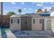 Well-maintained outdoor shed with double doors, providing secure storage and enhancing backyard organization at 4644 Canna Dr, Las Vegas, NV 89122