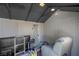 Organized shed interior with storage and lighting, offering functional and practical space for various needs at 4644 Canna Dr, Las Vegas, NV 89122