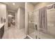 Beautiful bathroom with a glass shower door, tiled walls, and sleek design at 4893 E Cedar Creek Way, Pahrump, NV 89061