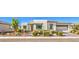 Stylish single-story home with desert landscaping, a neutral color palette, and a two car garage at 4893 E Cedar Creek Way, Pahrump, NV 89061