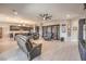 Spacious living room with media center, lots of seating and bright lighting at 4893 E Cedar Creek Way, Pahrump, NV 89061