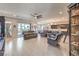 Open-concept living room with tile floors and lots of natural light at 4893 E Cedar Creek Way, Pahrump, NV 89061