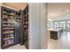 A glimpse into a pantry space with built-in shelving and tons of storage opportunities at 4893 E Cedar Creek Way, Pahrump, NV 89061