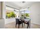 Cozy dining area with natural light, backyard view and column accents at 5067 Pensier St, Las Vegas, NV 89135