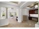 Bright living space seamlessly connects to dining, offers stunning views, and includes built-in office at 5067 Pensier St, Las Vegas, NV 89135