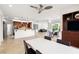 Open concept featuring a kitchen, dining area, and living room providing a seamless space for Gathering and entertaining at 5067 Pensier St, Las Vegas, NV 89135