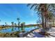 Picturesque water feature with palm trees and landscaping at 5067 Pensier St, Las Vegas, NV 89135