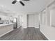 Inviting living space merges with an open kitchen, creating an airy and connected living experience at 5213 Giallo Vista Ct, North Las Vegas, NV 89031