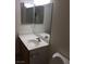Bathroom featuring a white sink, vanity and a large mirror above at 5655 E Sahara Ave # 1037, Las Vegas, NV 89142