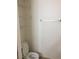Modest bathroom featuring white fixtures, towel rack, and shelving for storage at 5655 E Sahara Ave # 1037, Las Vegas, NV 89142