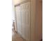 White sliding doors to a closet in a home interior at 5655 E Sahara Ave # 1037, Las Vegas, NV 89142
