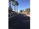 An entry gate with mature trees around it at 5655 E Sahara Ave # 1037, Las Vegas, NV 89142